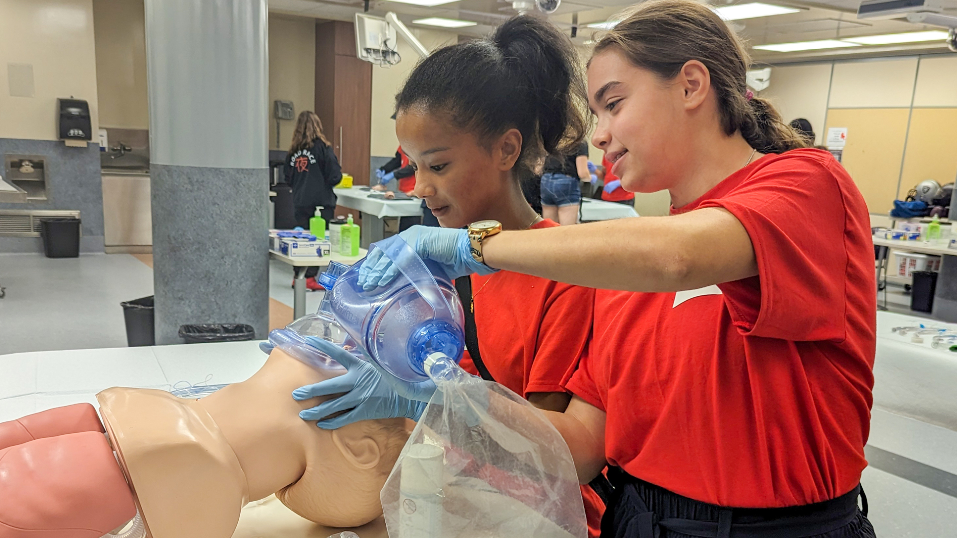 Students intubating a manikin