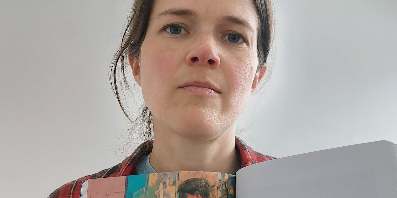 Candice Wendt holding a magazine