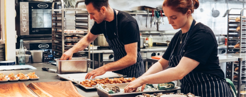 Employees in a restaurant kitchen