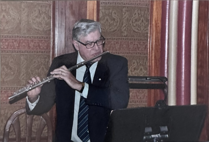 Lawrence Mysak playing a flute