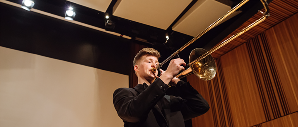 Solo musician on stage performing