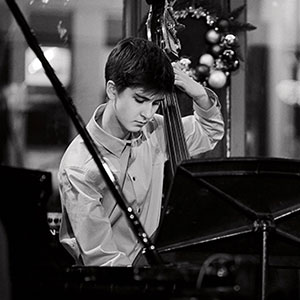 Black and White photo of young musician playing double bass