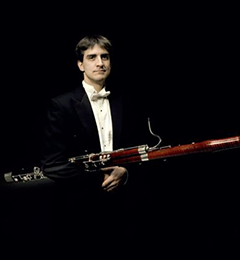 mathieu-harel-standing-holding-bassoon