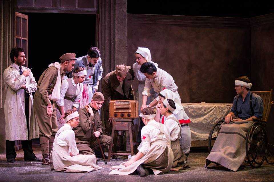 An image of Opera McGill's 2014 production of Pygmalion. There are wounded soldiers being tended to by nurses on stage.