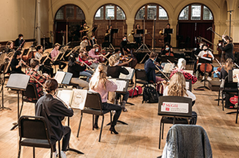 student musicians at a MGSO rehearsal in Redpath Hall