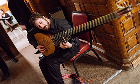 Musician holding instrument