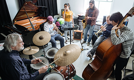 Jazz musicians playing in a circle