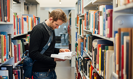 student musician in library