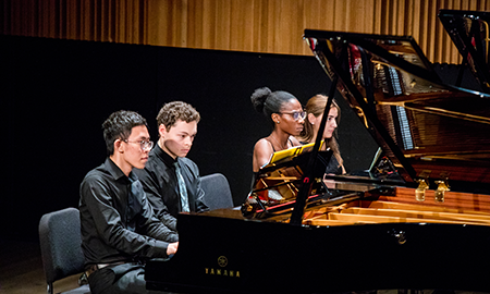 Four pianist  at piano