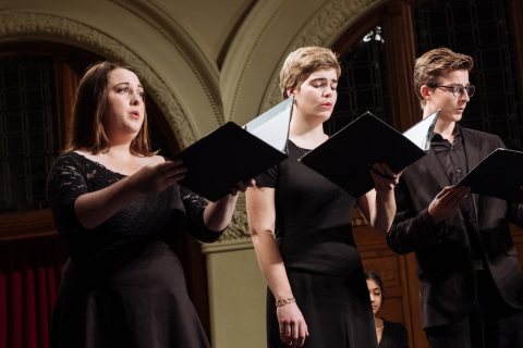Three singers from Cappella Antica in performance