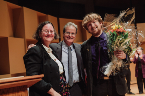 Cellist Joshua Morris with Dean Julie Cumming and Jury Chair Douglas McNabney Credit; Brent Calis