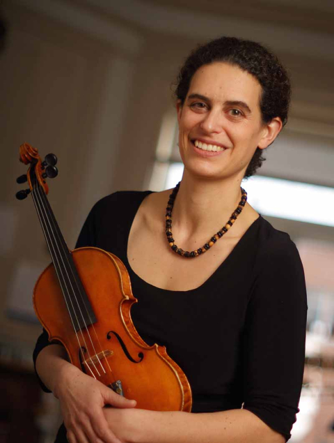 Graduate Student Laura Risk, with her violin