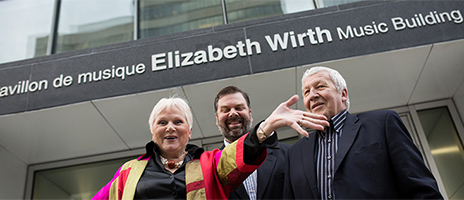Elizabeth Wirh stands outside the building named in her honour 