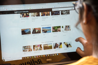 Someone looking laptop screen