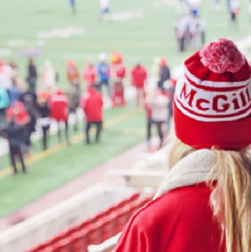 McGill student watching football game