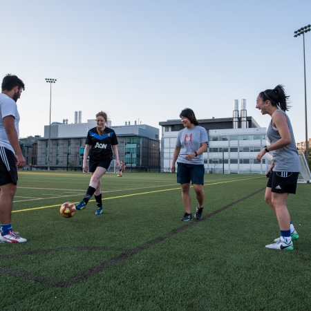Students playing soccer