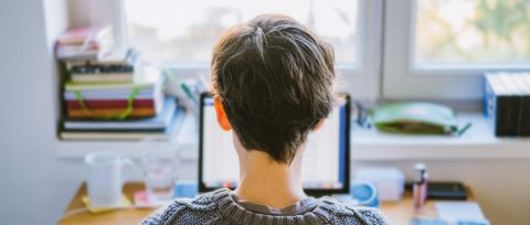 A patient in front of a computer screen