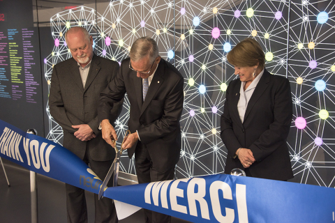 From left, Dr. Guy Rouleau, Director of The Neuro, Jacques Bougie, Co-Chair of the Thinking Ahead Campaign and Chair of the Neuro Advisory Board, and Suzanne Fortier, Principal and Vice-Chancellor of McGill University, cut the ribbon at the donor wall unveiling. 
