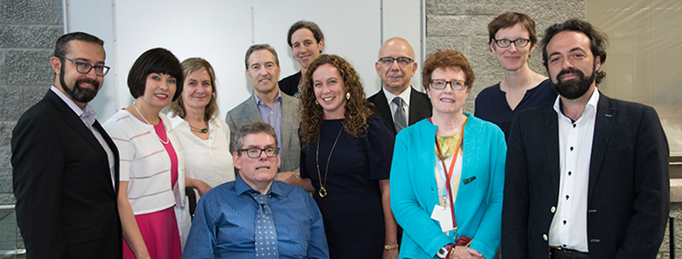Researchers involved in recently-funded CIHR team grants addressing aging, cardiovascular and brain health challenges in people living with HIV, with Minister of Health Ginette Petitpas Taylor, Cara Tannenbaum, Scientific Director of the CIHR Institute of Gender and Health, and community activist Guy-Henri Godin at The Neuro on May 31, 2018.