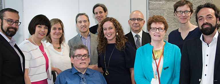 Researchers involved in recently-funded CIHR team grants addressing aging, cardiovascular and brain health challenges in people living with HIV, with Minister of Health Ginette Petitpas Taylor, Cara Tannenbaum, Scientific Director of the CIHR Institute of Gender and Health, and community activist Guy-Henri Godin at The Neuro on May 31, 2018.