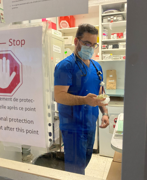 Nurse Mathieu Raymond Tremblay preparing a patient's medication