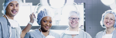 Neuro team of four people smiling