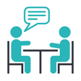 Icon with two persons sitting at a table and chatting