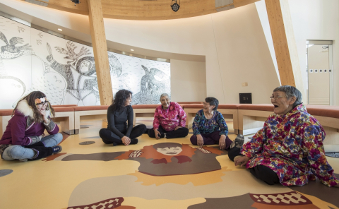 Elders sit on the floor of the Knowledge Sharing Centre at the CHARS building, Ikaluktutiak. Credit: Alex Fradkin