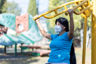Woman exercising outdoors during the pandemic