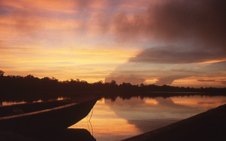 Sunset from the coring platform on Laguna Itzan. Faecal records from lake sediment show that Maya lived in the area for longer than previously believed. Credit: Andy Breckenridge