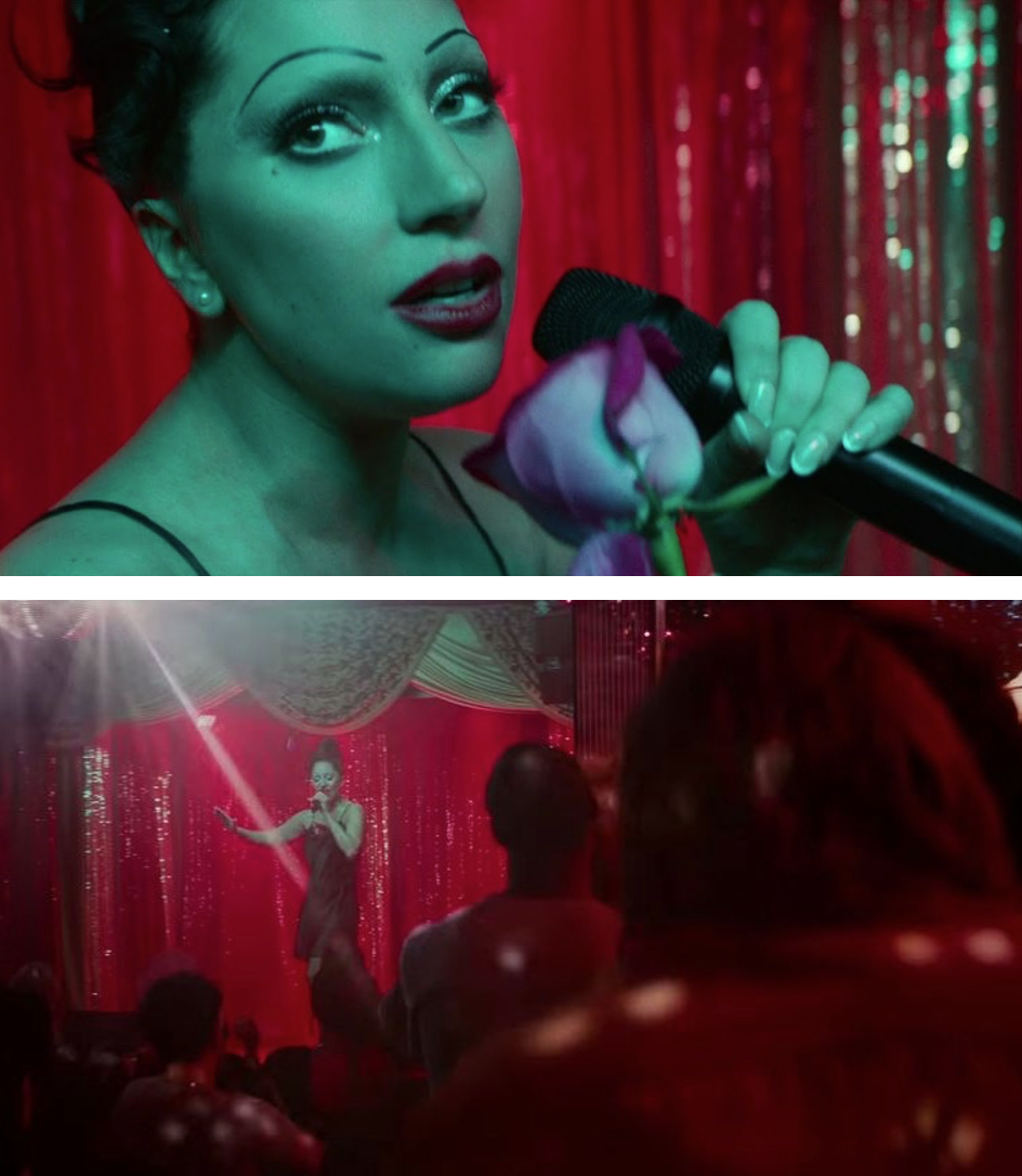 Figure3b Woman performing face close-up and standing on stage.