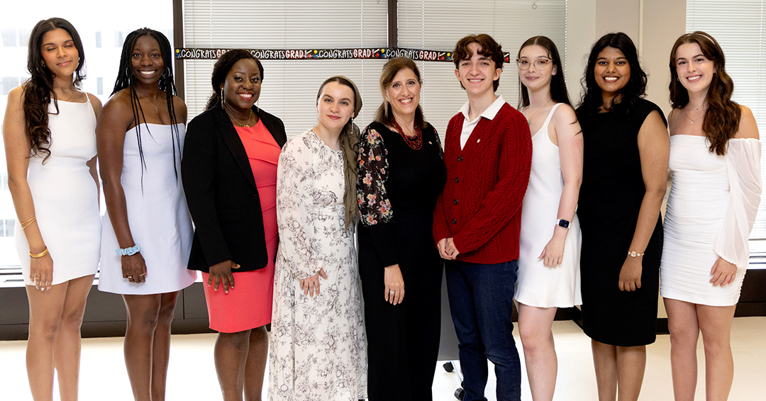 Associate Professor Lia Sanzone (centre) with 8 convocation prize winners