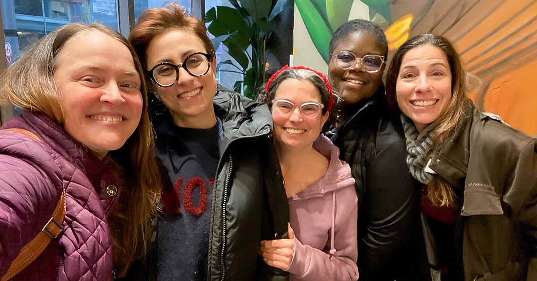 Classmates who are now colleagues meet for lunch.  