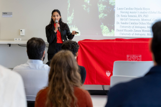 Student presents her research project which took place in Colombia.