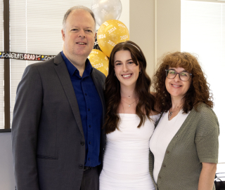 Noemi Rancourt with proud parents