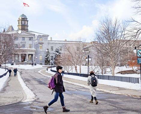 Students on McGill downtown campus walkway in the winter