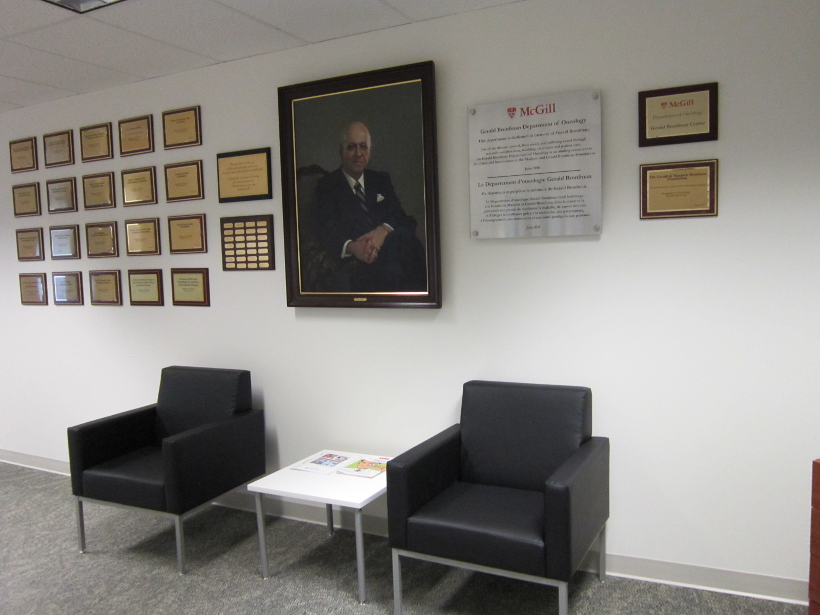 Wall with historical plaques in the Department of Oncology