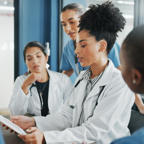 Team of doctors reviewing data