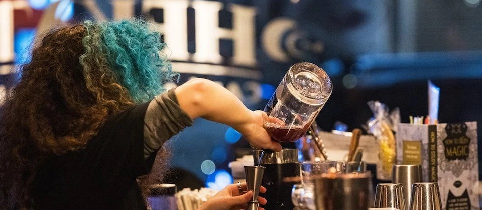 Woman preparing a non-alcoholic beverage