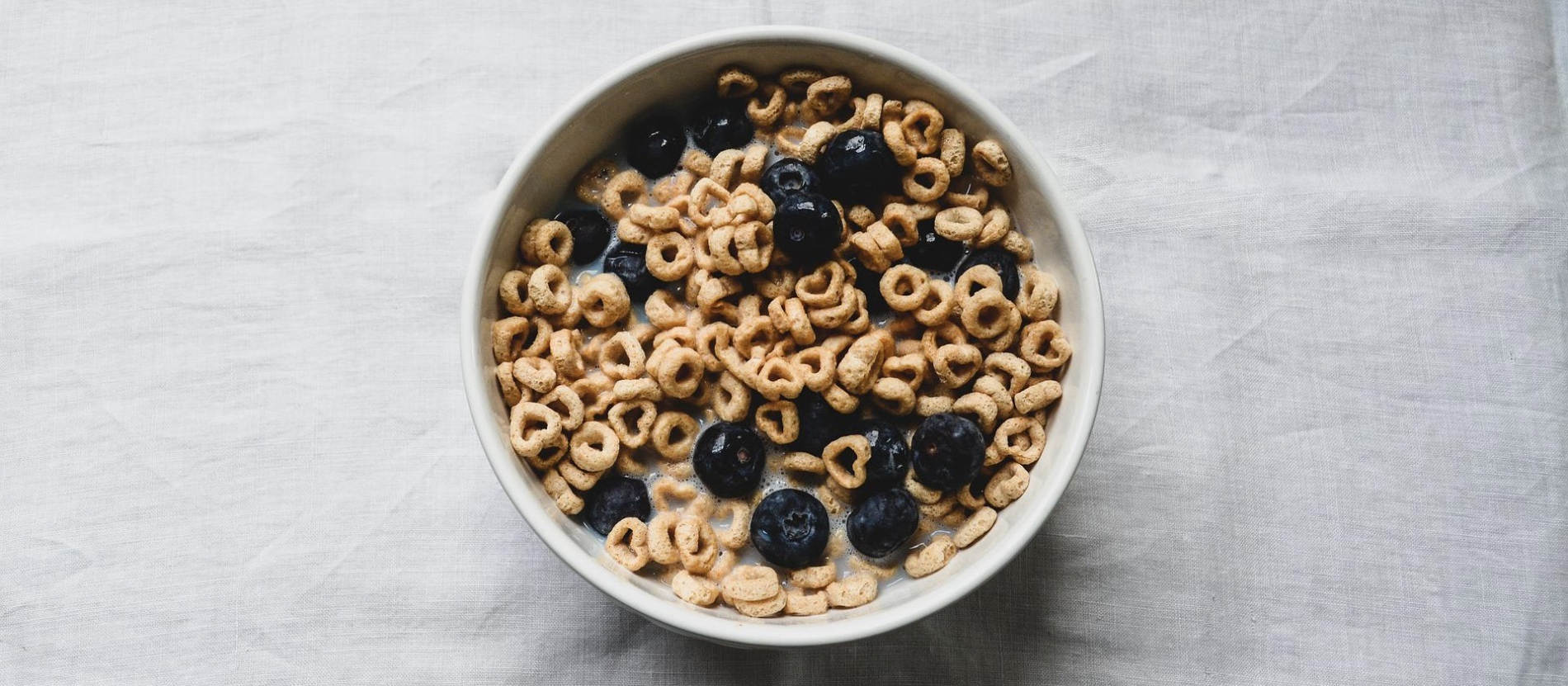 bowl of cheerios with blueberries