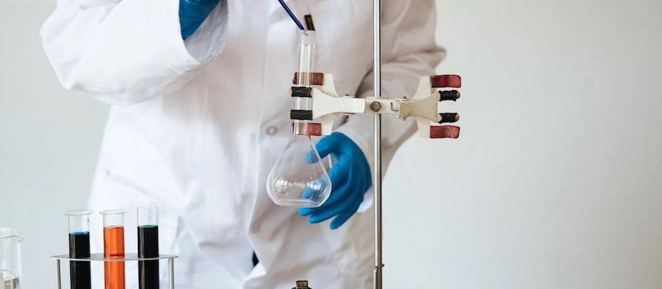  laboratory technician conducting chemical test