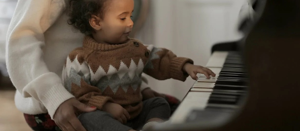 baby playing the piano