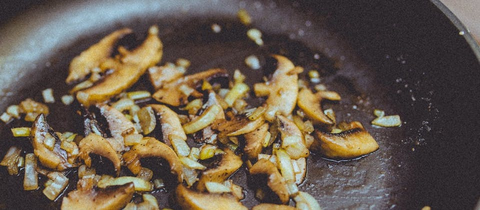 Closeup Photography of Sauteed Garlic and Mushrooms