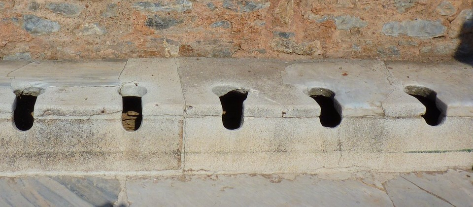 Ancient latrines made of stone.