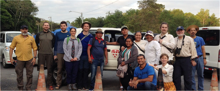 Field researchers standing in front of McGill truck