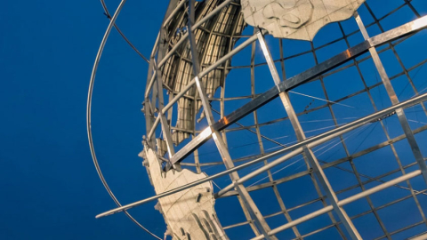 Decorative metal globe on a blue background