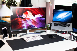 laptop and desktop side by side