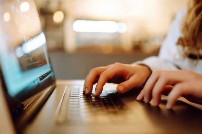 Laptop and hands