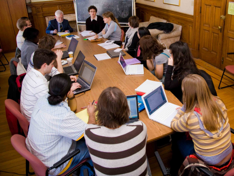 Graduate students in conference room