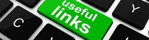 keyboard with a bright green button called useful links